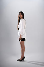 WHISPER TOP